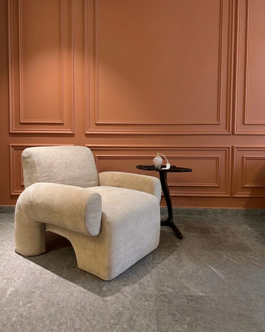 Fauteuil bouclé crème